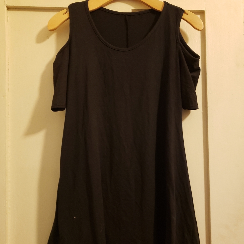 Black knee length dress.